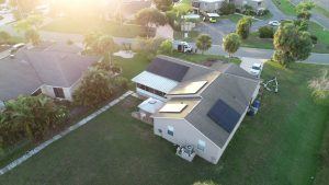 Drone view of solar system installed on a shingle roof in Apollo Beach, FL