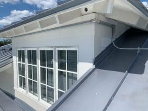 Conduit run for a solar installation on a metal roof in WInter Haven, FL