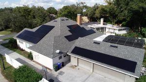 Aerial view of a solar installation on a shingle roof in Lakeland, FL